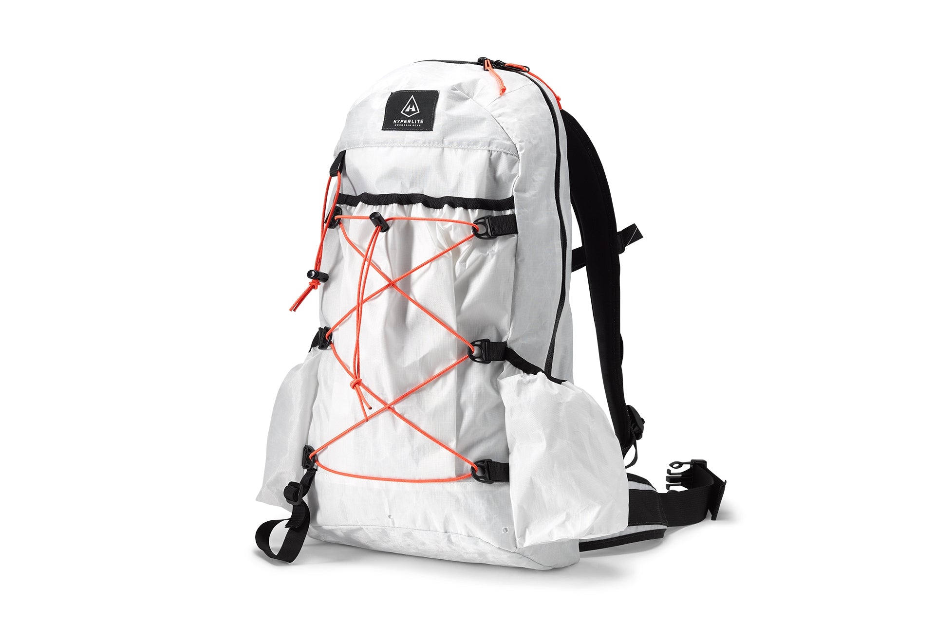 A white backpack with orange straps.